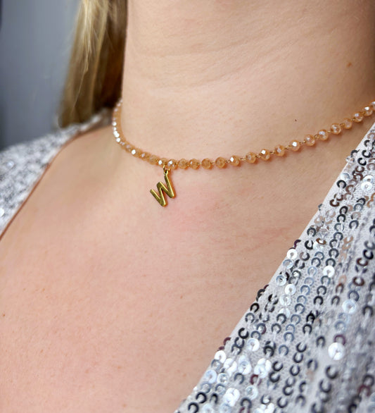 Collier déterminé beige